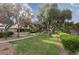 Picturesque community with lush landscaping, mature trees, and meticulously maintained grounds at 3440 Pino Cir, Las Vegas, NV 89121