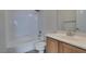 Well-lit bathroom with a tub-shower combo and vanity with ample counter space at 3801 W Hammer Ln, North Las Vegas, NV 89031