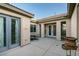 Private courtyard with a cozy seating area, perfect for outdoor relaxation at 3801 W Hammer Ln, North Las Vegas, NV 89031
