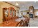 Charming dining room with a large wooden table and ornate furnishings, perfect for Gathering meals at 3801 W Hammer Ln, North Las Vegas, NV 89031