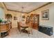 Well-appointed dining room with a vintage chandelier and classic furnishings at 3801 W Hammer Ln, North Las Vegas, NV 89031