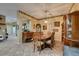 Inviting dining room with a spacious layout, traditional furnishings, and warm lighting at 3801 W Hammer Ln, North Las Vegas, NV 89031