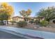 Charming single-story home with a well-maintained front yard and desert landscaping at 3801 W Hammer Ln, North Las Vegas, NV 89031
