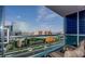 Enjoy stunning city views from this balcony with sleek railings and comfortable seating, overlooking vibrant cityscape and active freeway at 4575 Dean Martin Dr # 3007, Las Vegas, NV 89103