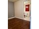 Bedroom featuring hardwood floors and an attached bathroom at 4575 Dean Martin Dr # 3007, Las Vegas, NV 89103