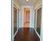 Hallway with hardwood floors and sliding mirror doors at 4575 Dean Martin Dr # 3007, Las Vegas, NV 89103