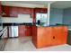 Kitchen featuring an island with bar seating, granite countertops, and stainless steel appliances at 4575 Dean Martin Dr # 3007, Las Vegas, NV 89103