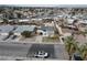 An aerial shot showcases the property's location in a quiet residential neighborhood at 4754 Marnell Dr, Las Vegas, NV 89121