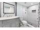 Beautiful bathroom with marble countertop, modern fixtures, and walk-in shower at 5516 Cory Pl, Las Vegas, NV 89107