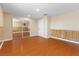 Bedroom featuring mirrored closet doors and wood-look floors at 5516 Cory Pl, Las Vegas, NV 89107