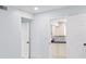 This is a bedroom area with a view into the kitchen at 5516 Cory Pl, Las Vegas, NV 89107