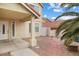 Inviting home featuring a covered porch, desert landscaping and a pathway to the entrance at 5516 Cory Pl, Las Vegas, NV 89107