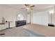This bedroom offers a ceiling fan and abundant storage with its large closet at 6435 Parrot Ridge Ct, Las Vegas, NV 89139
