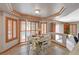 Sunlit dining area showcases shuttered windows, tile flooring, and a charming sunflower-themed table setting at 6491 Bright Nimbus Ave, Las Vegas, NV 89139