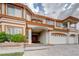 Inviting front entrance of a home with a three-car garage and decorative pillars at 6491 Bright Nimbus Ave, Las Vegas, NV 89139
