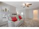 Main bedroom with fireplace, ceiling fan and sitting area at 6491 Bright Nimbus Ave, Las Vegas, NV 89139