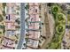 An aerial view of home highlighting its beautiful landscaping, proximity to the golf course, and a well maintained street at 7567 Wingspread St, North Las Vegas, NV 89084