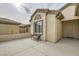 Inviting front porch with a bench, decorative window, and tiled entryway to the charming single-story home at 7567 Wingspread St, North Las Vegas, NV 89084