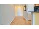 Bright hallway with neutral paint and tile flooring at 7567 Wingspread St, North Las Vegas, NV 89084