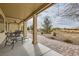 Inviting covered patio overlooking a beautifully landscaped yard and golf course at 7567 Wingspread St, North Las Vegas, NV 89084