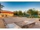Well-maintained shuffleboard courts and recreation area surrounded by lush landscaping at 7567 Wingspread St, North Las Vegas, NV 89084