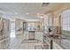 Stylish kitchen with granite counters, stainless appliances, and decorative backsplash tiles at 7581 Slipstream St, Las Vegas, NV 89139