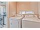 Laundry room featuring standard white washer and dryer at 7581 Slipstream St, Las Vegas, NV 89139
