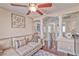 Inviting living room featuring hardwood floors, stylish decor, and an open layout at 7581 Slipstream St, Las Vegas, NV 89139