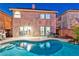 Home exterior showcasing a private pool and patio area, ideal for outdoor living at 7581 Slipstream St, Las Vegas, NV 89139