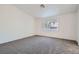 Bedroom with neutral color, gray carpet and large window at 800 Fetter Ct, Henderson, NV 89052