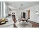 Stylishly staged kitchen featuring stainless steel appliances, dining area, and ample counter space at 800 Fetter Ct, Henderson, NV 89052