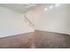 Spacious living room features hardwood floors, modern lighting, and staircase to the upper level at 800 Fetter Ct, Henderson, NV 89052