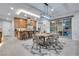 Open-concept kitchen and dining area featuring modern finishes and stainless steel appliances at 819 Bolide St, Las Vegas, NV 89138