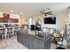 Open floorplan showcases the seamless flow from kitchen to living area, perfect for entertaining and everyday living at 8432 Alder Rain St, Las Vegas, NV 89113