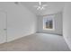 Bedroom with light carpet, a window, and white walls at 8805 Jeffreys St # 2082, Las Vegas, NV 89123