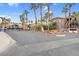 Gated entrance of a meticulously landscaped community, ensuring privacy and security for residents at 8805 Jeffreys St # 2082, Las Vegas, NV 89123