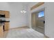 Bright kitchen features stainless steel appliances, light wood cabinets, and sliding door to patio at 8805 Jeffreys St # 2082, Las Vegas, NV 89123