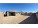 Large backyard area offers potential for customization and landscaping to create an inviting outdoor space at 9067 Mapledale Ranch Ct, Las Vegas, NV 89139