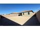 Spacious backyard bordered by a block wall, providing privacy and potential for creating a tranquil outdoor oasis at 9067 Mapledale Ranch Ct, Las Vegas, NV 89139