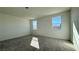 Comfortable bedroom features plush carpeting and ample windows offering a bright, airy atmosphere at 9067 Mapledale Ranch Ct, Las Vegas, NV 89139