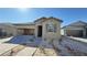 Charming single-story home showcasing desert landscaping and an attached two-car garage at 9067 Mapledale Ranch Ct, Las Vegas, NV 89139
