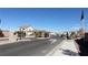 View of the decorative entrance to a residential neighborhood, featuring landscaping and attractive gates at 9189 Oakdale Ranch Ct, Las Vegas, NV 89139