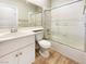 Well-lit bathroom with a shower-tub combination and white vanity with sink at 1001 Collingtree St, Las Vegas, NV 89145