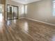 Spacious bedroom featuring hardwood flooring and large mirrored closet at 1001 Collingtree St, Las Vegas, NV 89145