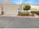 Charming home featuring a two-car garage, neutral colors, and well-maintained landscaping at 1001 Collingtree St, Las Vegas, NV 89145