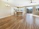 Spacious living room with wood floors, natural light, and open concept layout at 1001 Collingtree St, Las Vegas, NV 89145