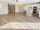 Open-concept living space boasts new hardwood floors, recessed lighting, and a ceiling fan at 1001 Collingtree St, Las Vegas, NV 89145
