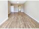 Large, inviting living room with hardwood flooring, neutral walls, and ample natural light at 1001 Collingtree St, Las Vegas, NV 89145