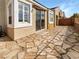 Private outdoor patio area with unique stone pavement at 1001 Collingtree St, Las Vegas, NV 89145