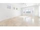 Spacious primary bedroom with tile floor, neutral paint, and bright natural light at 10227 Sunset Gardens Dr, Las Vegas, NV 89135